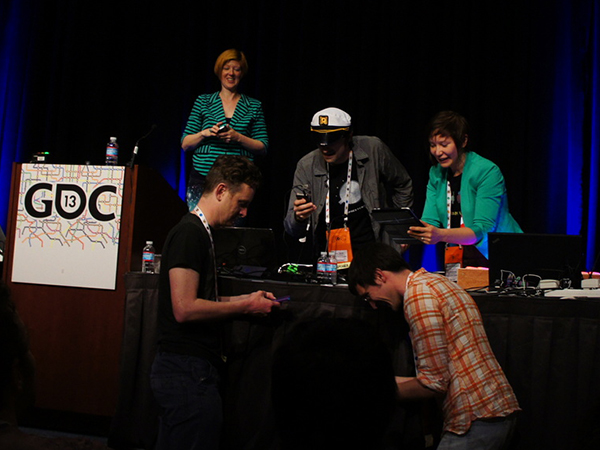 Organisers and presenters setting up on stage at GDC 2013