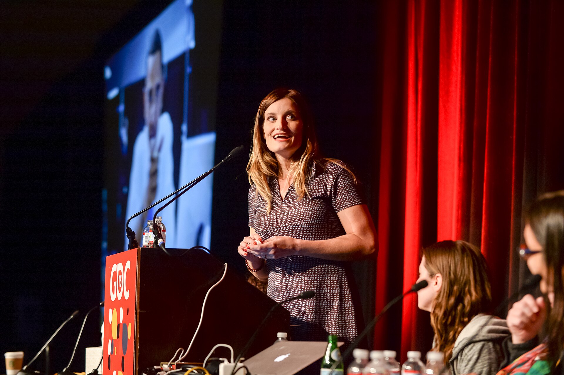 A speaker presenting at the Game Developers Conference