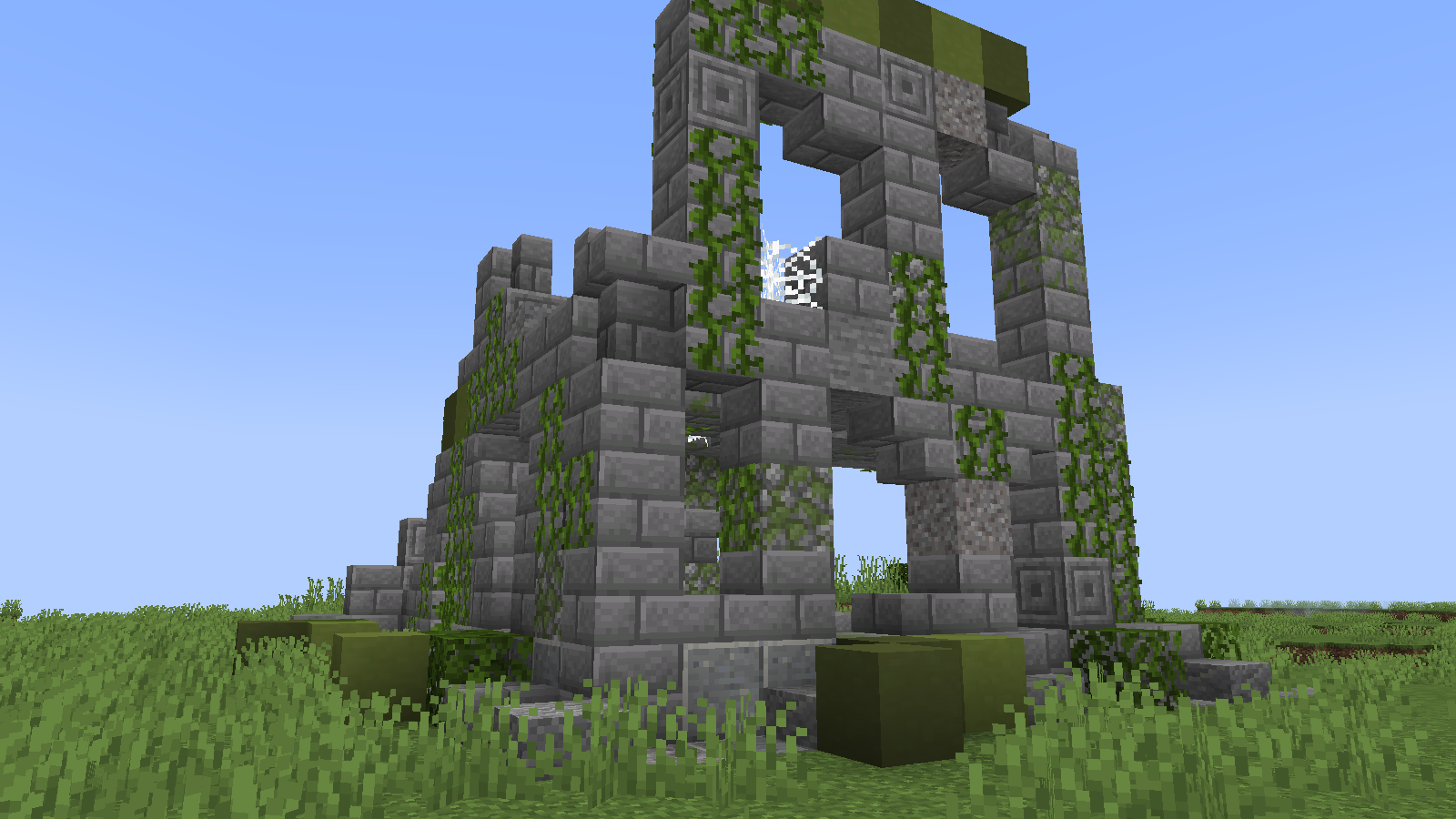 Broken structure half-buried in a hillside