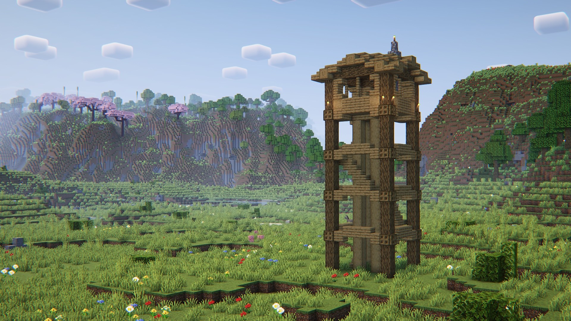 Wooden watchtower overlooking forest terrain