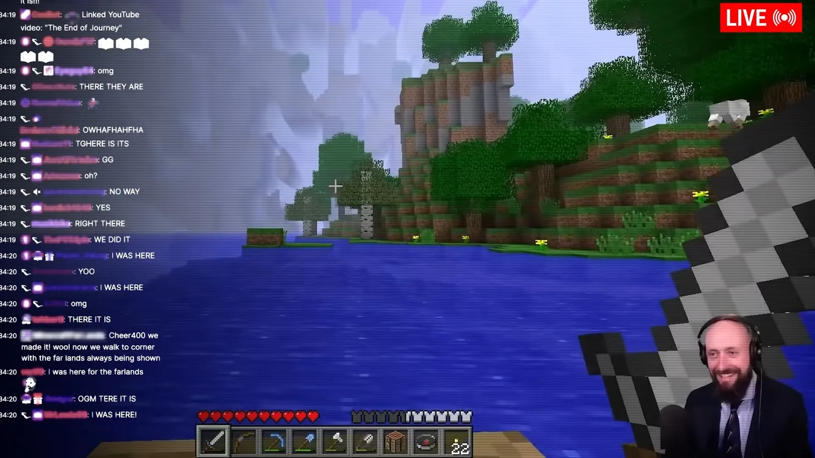 KurtJMac's livestream showing his Minecraft world and live chat as he approaches the Far Lands