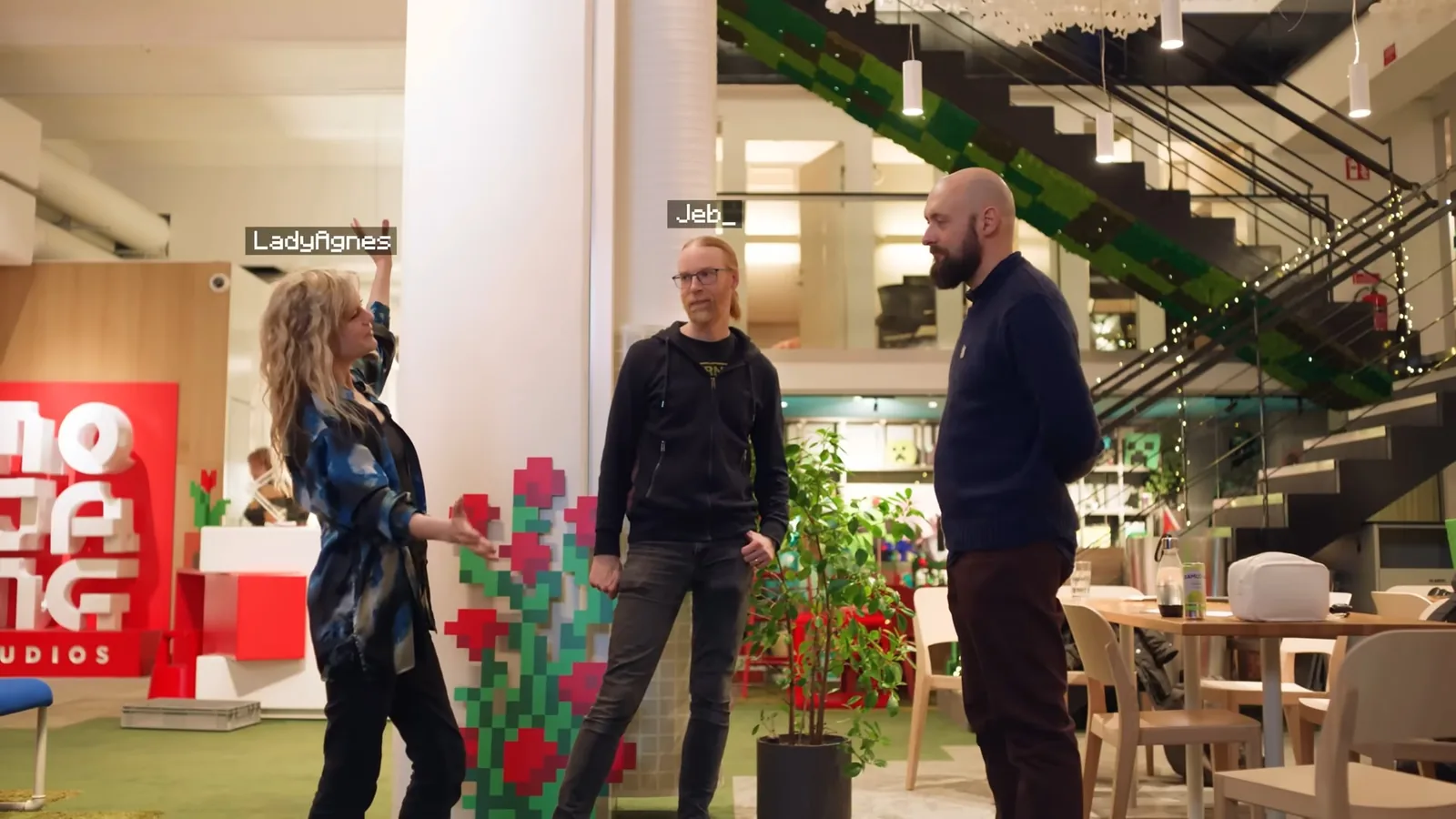 People walking through the Mojang Studios office in the Minecraft documentary