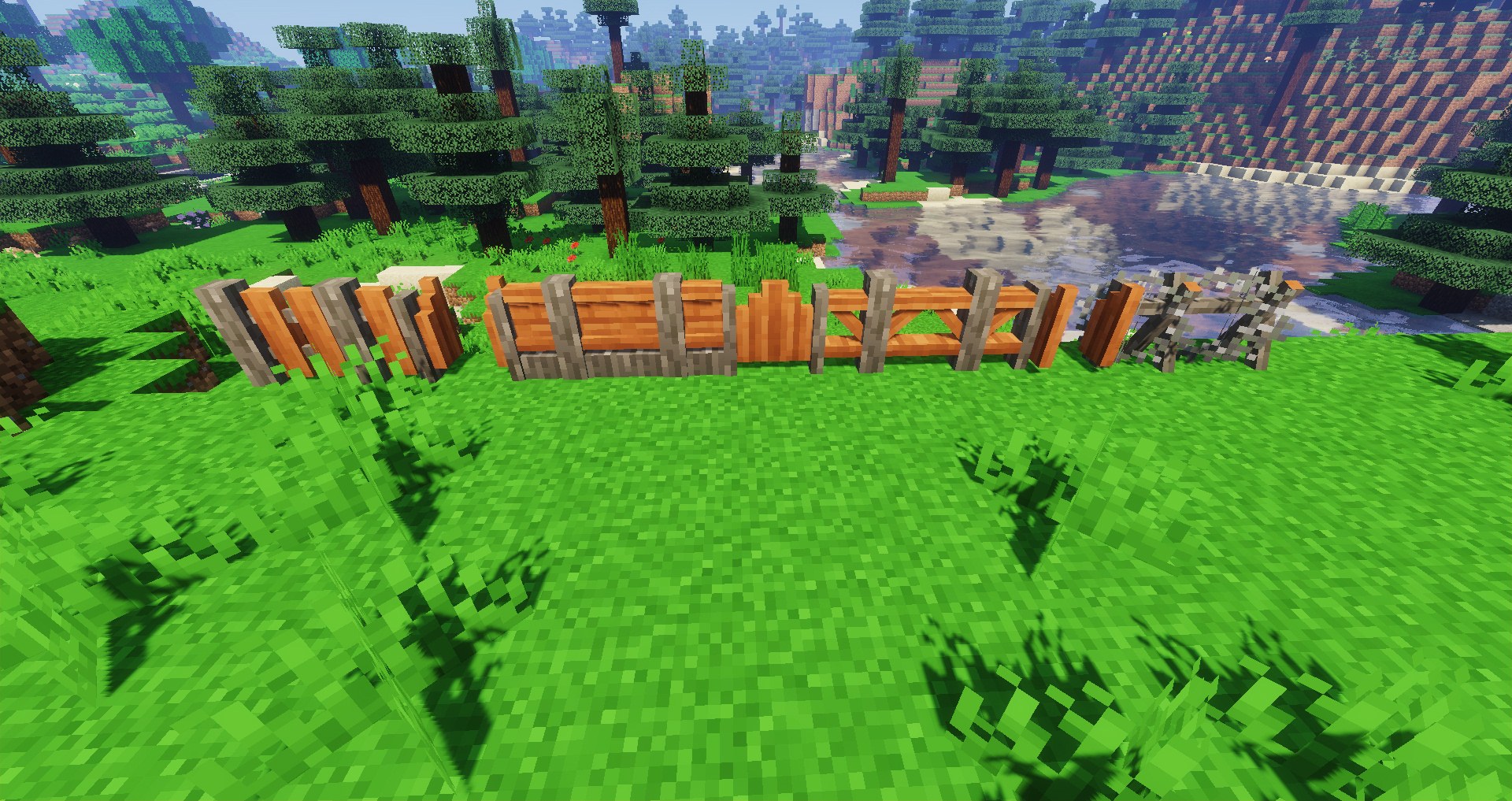 Row of wooden fence styles in different wood types