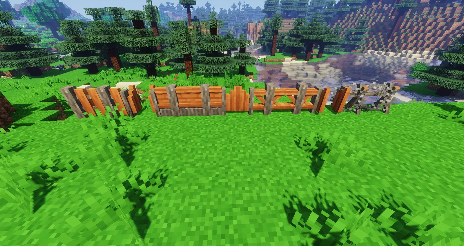 Row of wooden fence styles in different wood types
