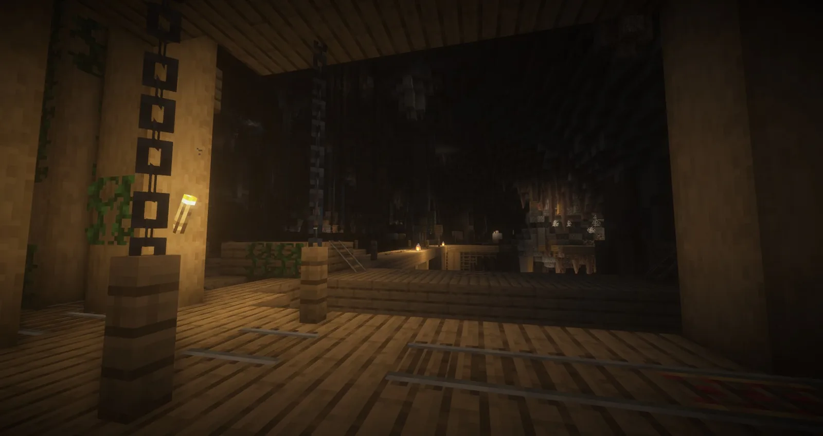 Large mineshaft cavern with wooden scaffolding
