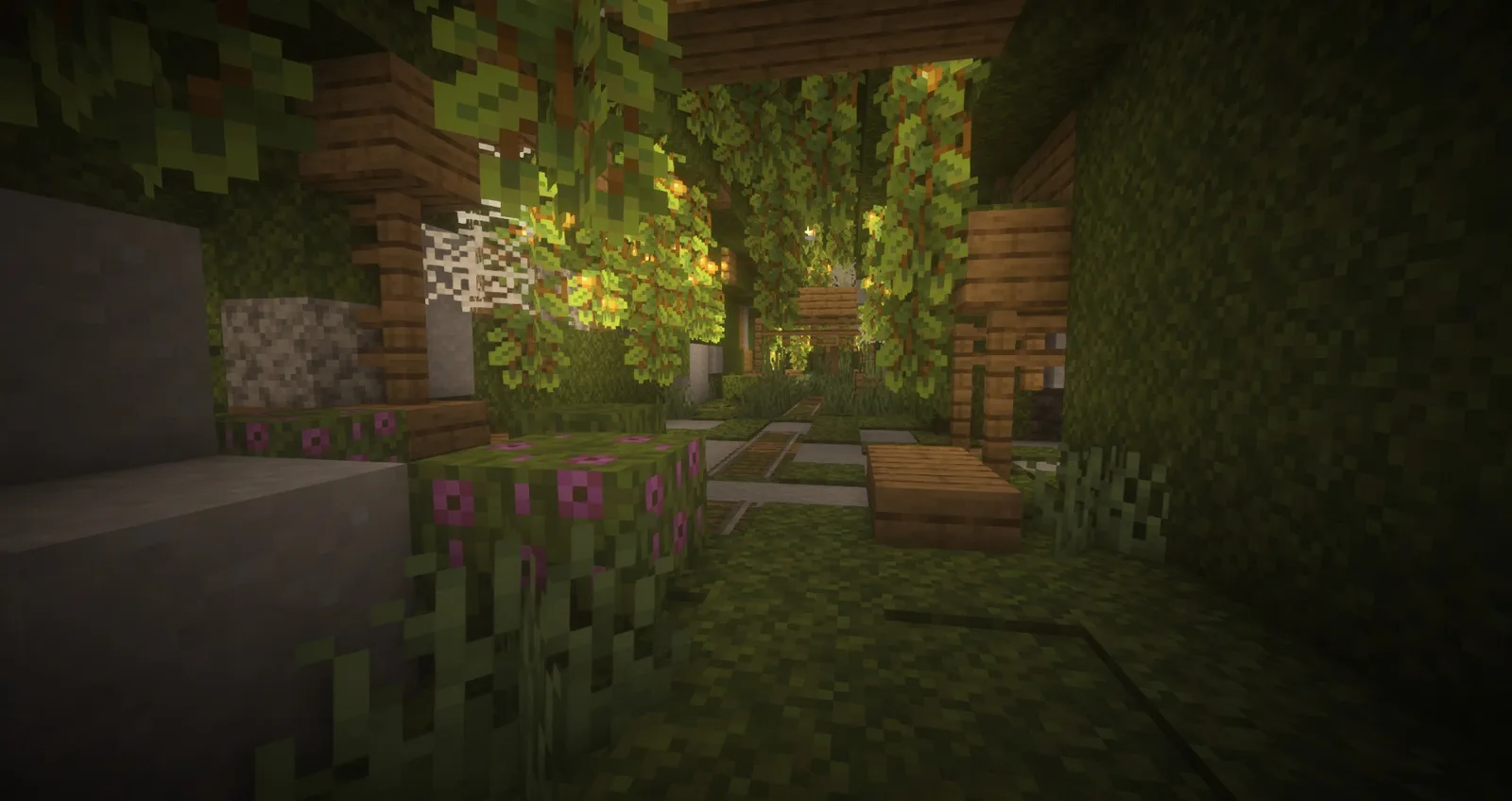 Reinforced mineshaft tunnel with support beams and rails