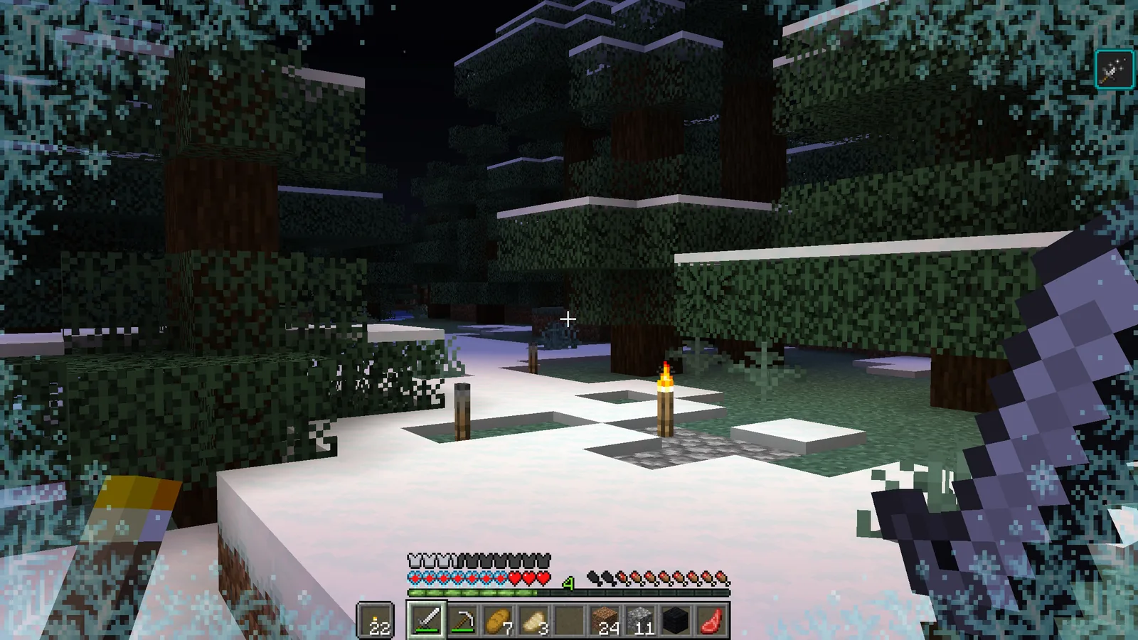 Powder snow pit trap in a snowy Minecraft biome