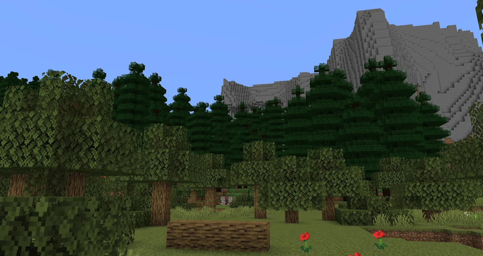 Traverse biome transition seen from a hilltop in Minecraft